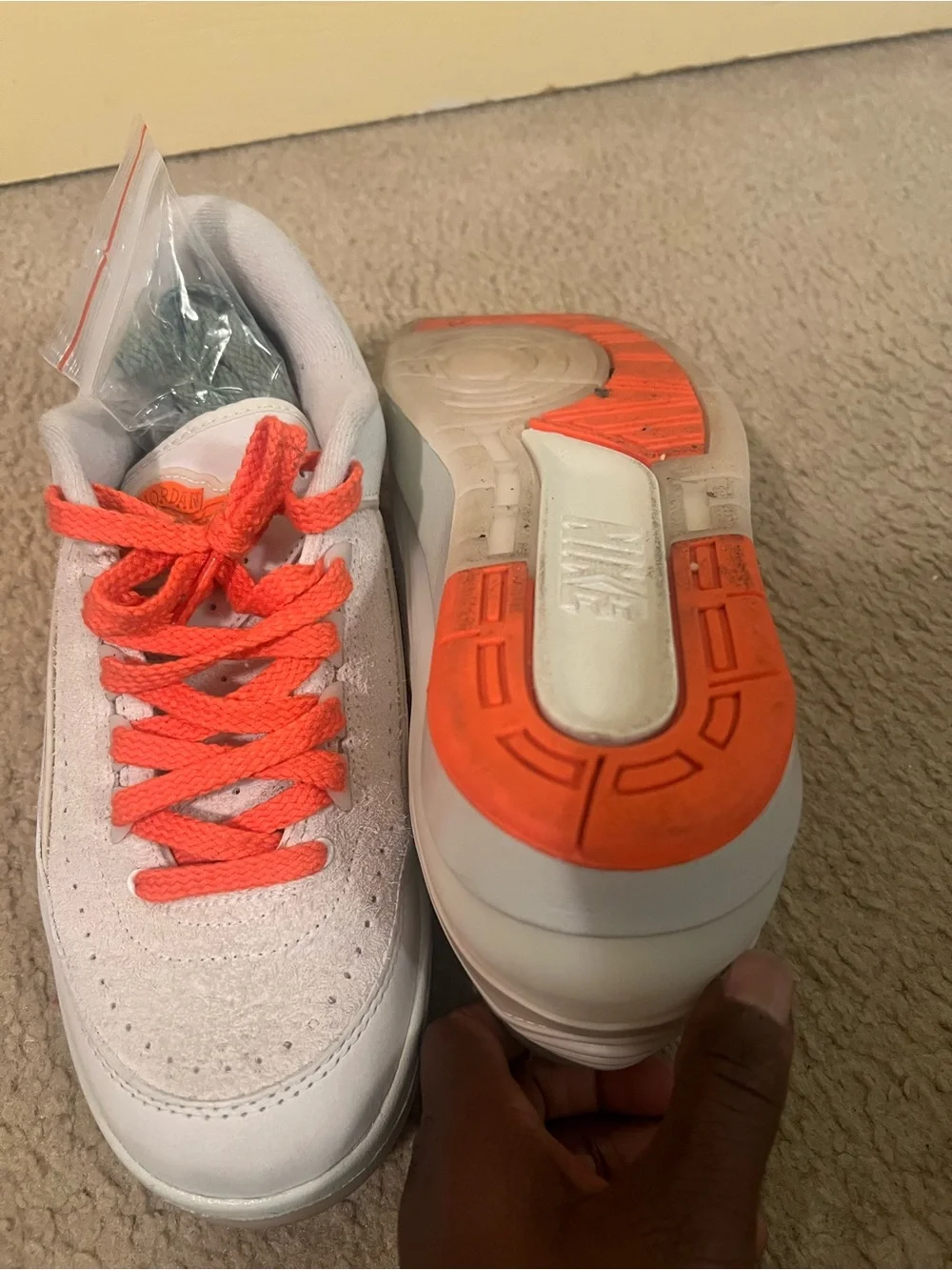 Nike White Sneakers with Bright Orange Accents